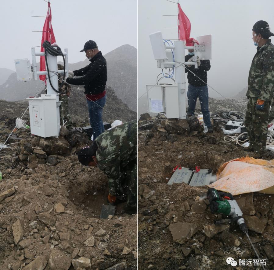 工作人员在山顶紧张安装中